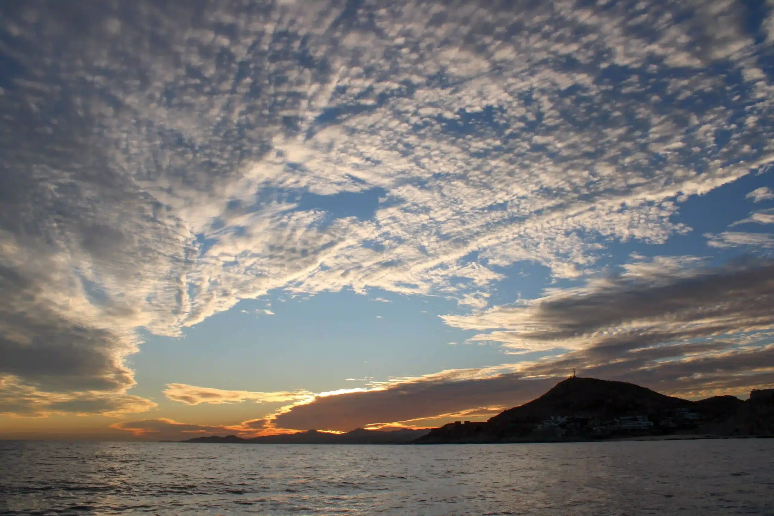 Open-sea twilight view framing the Hotel Zone – Best Sunset Photography in San José del Cabo – Top Spots