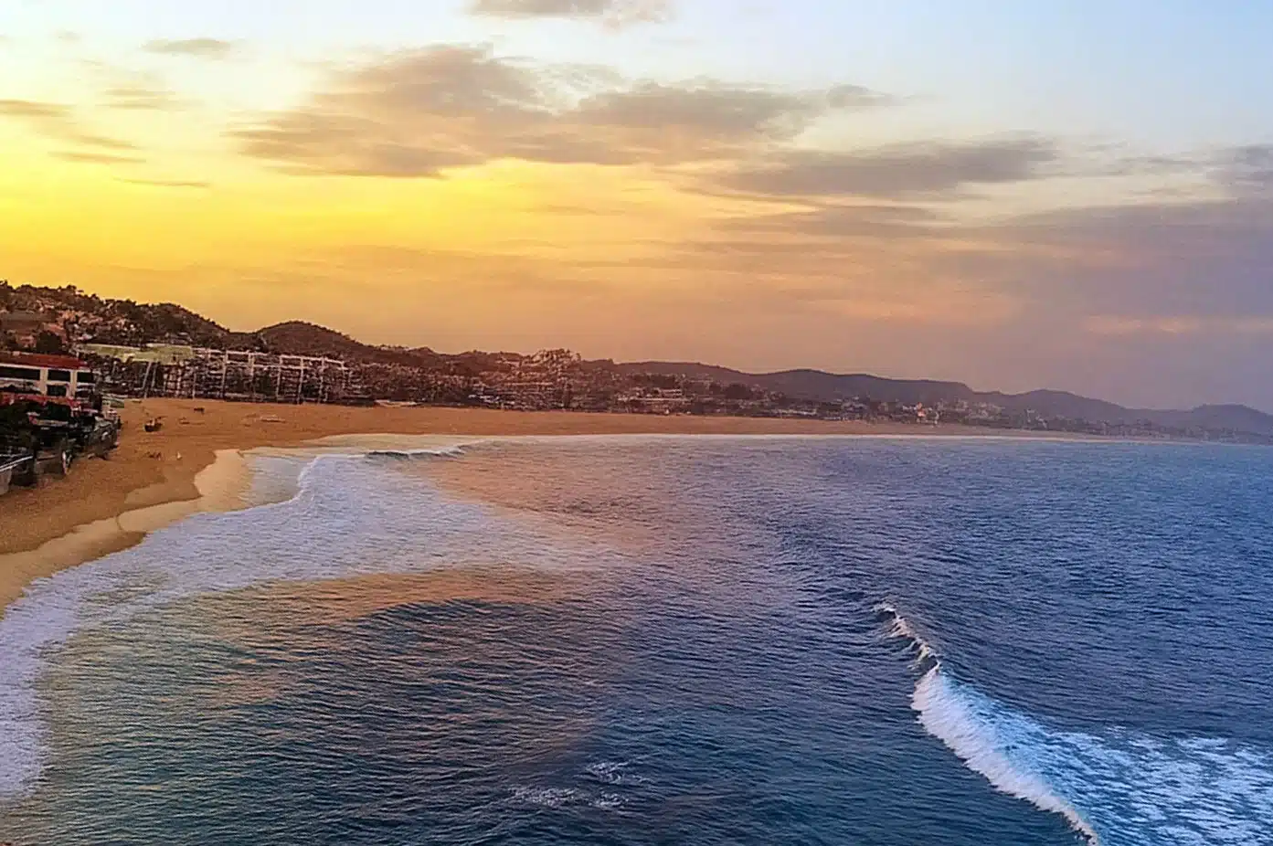Hotel-area shoreline with golden-hour light over the Sea of Cortez