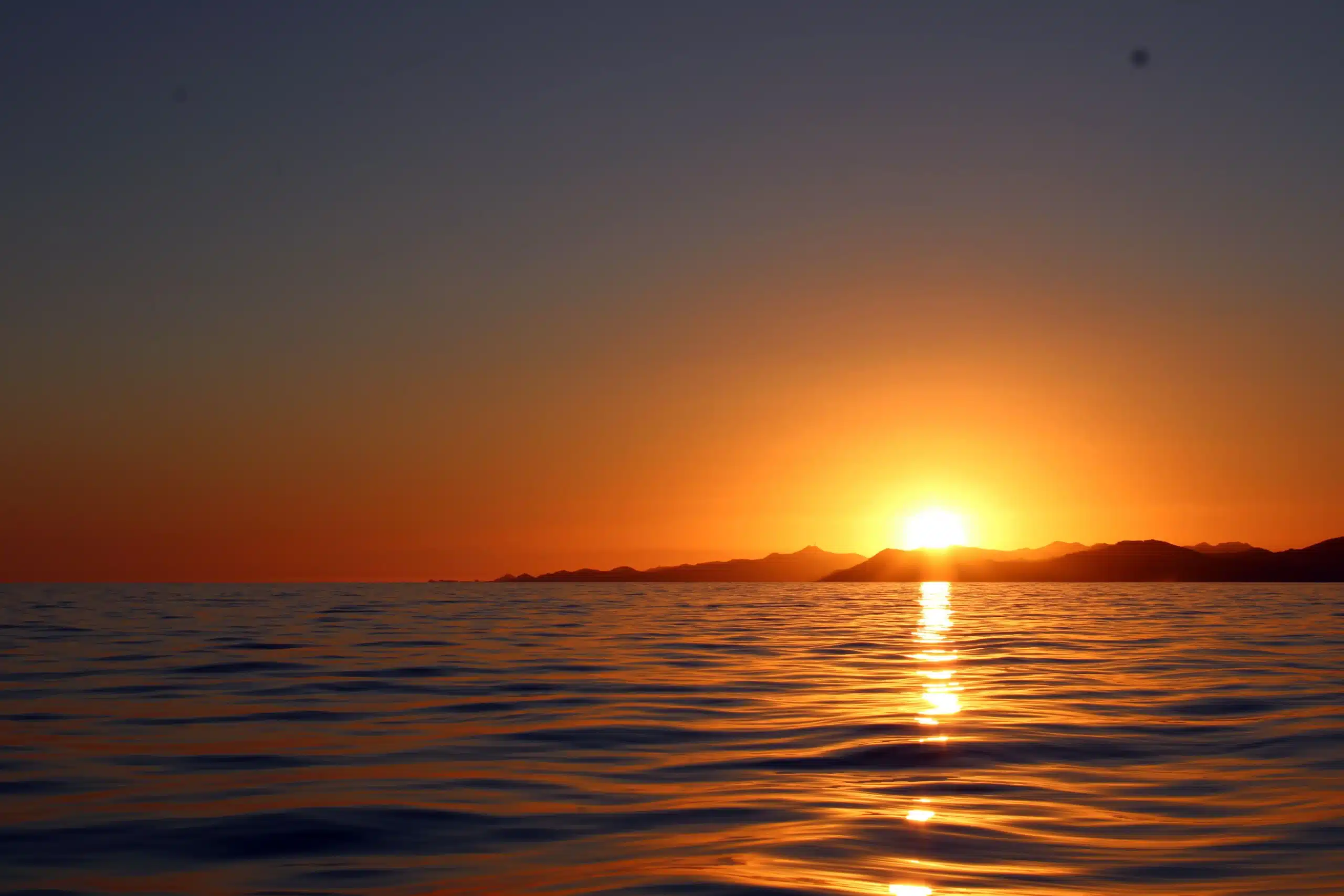 San Jos&eacute; del Cabo sunset with mountain range silhouette