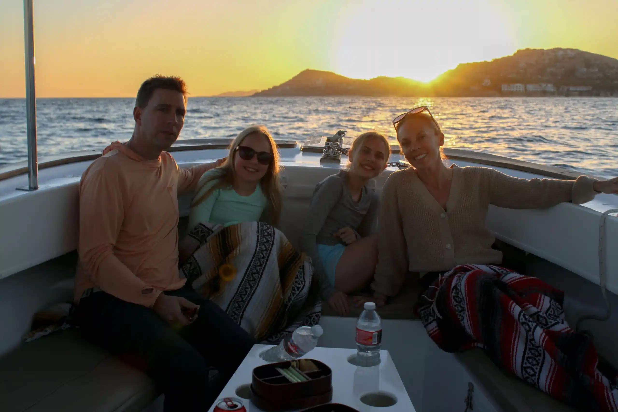 Family enjoying Cabo Sunset Cruises for Families together