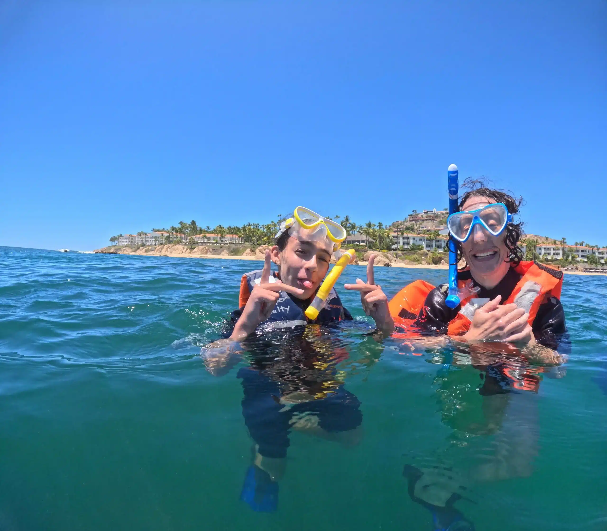 Beginner snorkelers in Cabo Mexico enjoying reef tour